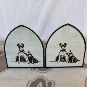 Two dog-themed bookends with black and white illustrations of dogs.